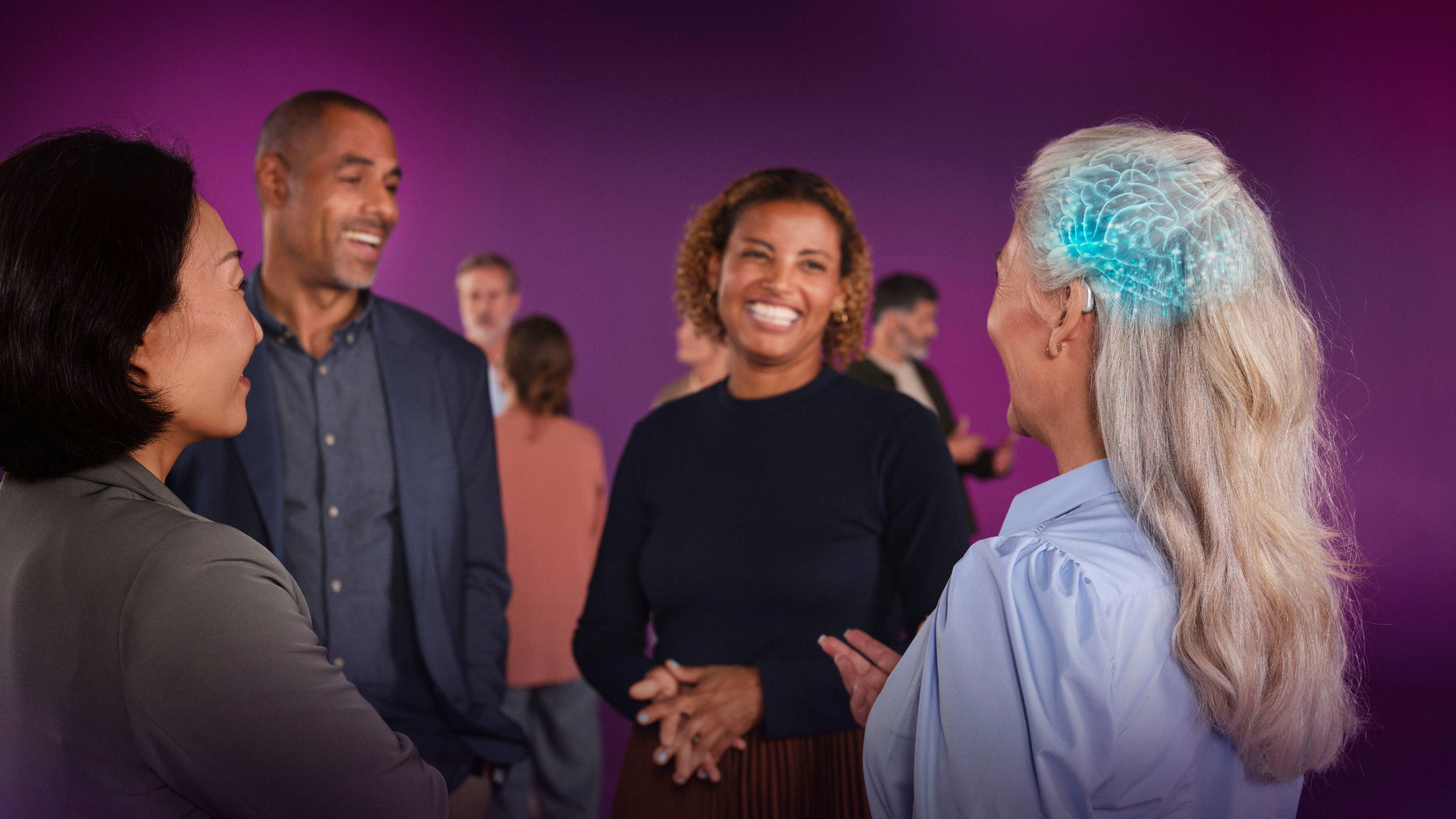 woman with hearing loss talking with other using hearing aid. 