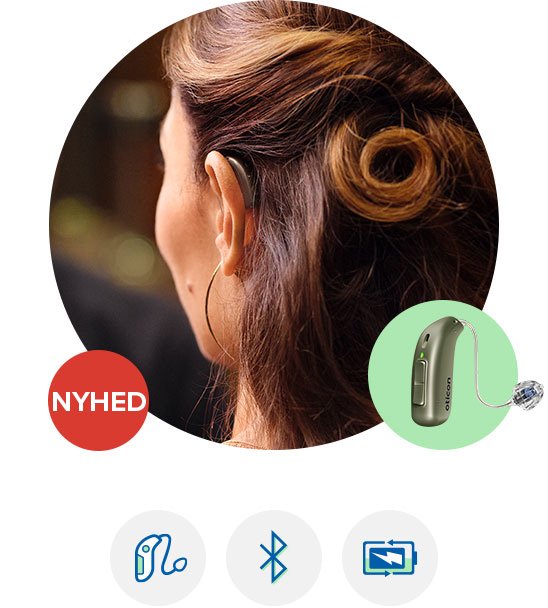 Oticon Real høreapparat båret af brunhåret kvinde med opsat frisure