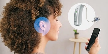 Aide auditive Audika Extra connectée à un smartphone pour une écoute optimisée