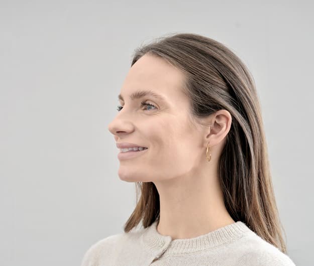 Appareils auditifs Blink B500 portés de face