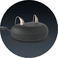 Apparecchi acustici ricaricabili Audika Full su base di ricarica