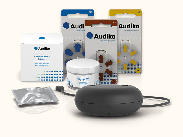 hoortoestel accessoires en onderhoudsproducten van Audika, inclusief batterijen, droogsysteem en oplader