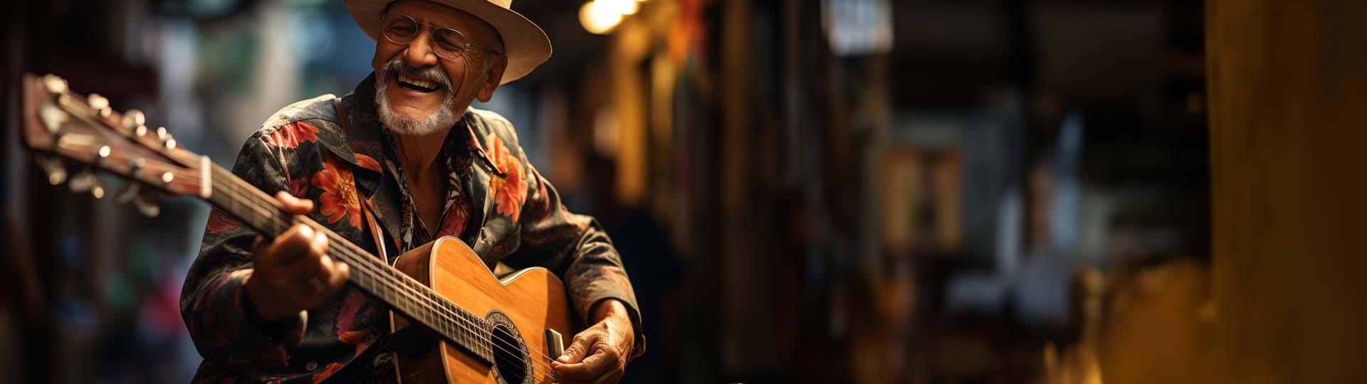 Man met hoed speelt gitaar in een sfeervolle omgeving.