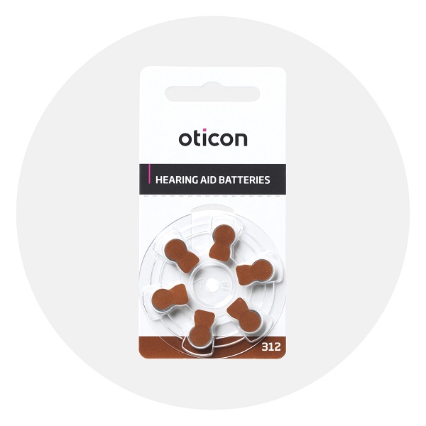 Baterie do aparatów słuchowych Oticon 312 na opakowaniu, widoczne na szarym tle.