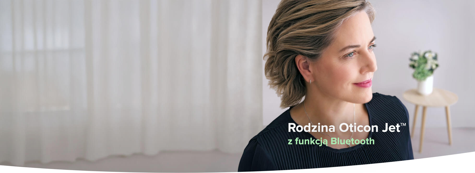 Wypróbuj aparat słuchowy douszny Oticon Jet™ w gabinecie.