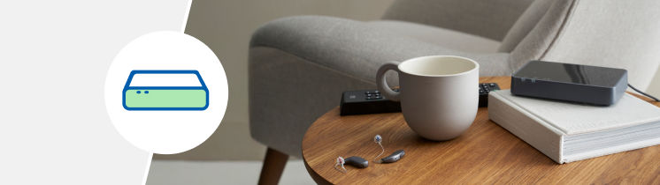 Akcesoria Oticon Jet™ – adapter TV do aparatów słuchowych.