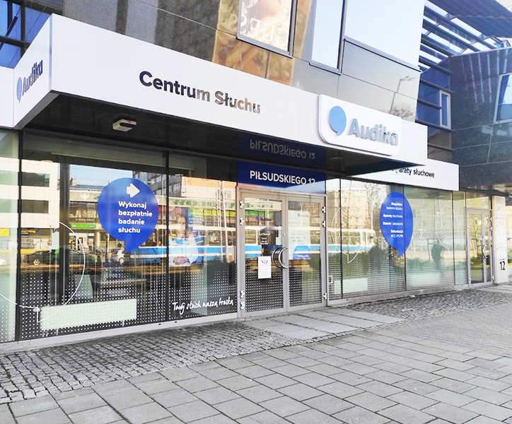 Nowoczesne Centrum Słuchu Audika na Piłsudskiego 12, oferujące badania słuchu i Gwarancję Plus.