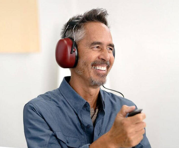 Image shows woman during hearing test