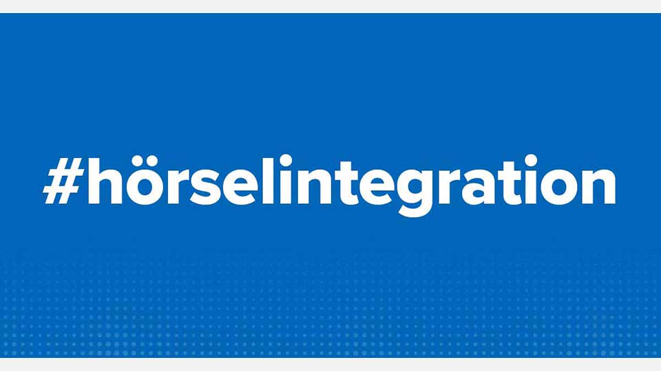  #hörselintegration på blå bakgrund.
