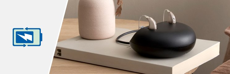  Uppladdningsbara batterier som laddas i en elegant laddningsstation för hörapparater