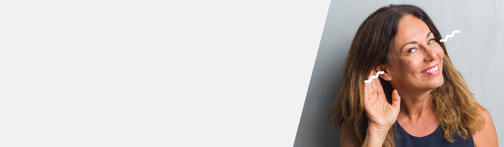 Kvinna som har en hörselnedsättning på båda öronen, en bilateral hörselnedsättning