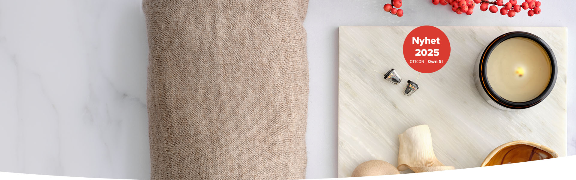 Bild på Oticon Own Si hörapparater som ligger på en bricka