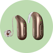 Två Oticon Intent hörapparater som du kan prova ut hos Audika