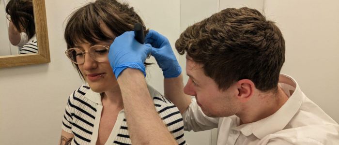 Gift of Hearing winner Megan receives professional ear care evaluation