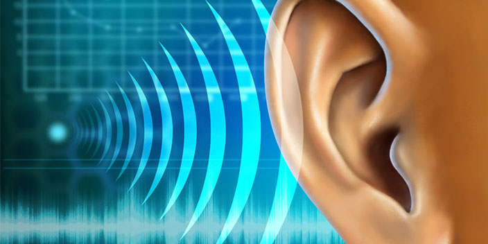 A close-up of a human ear receiving sound waves, depicted as blue, radiating arcs, against a digital background featuring a soundwave chart and grid, symbolizing advanced hearing care technology.