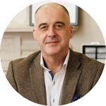 Enda Dooley, professional audiologist in a clinic setting