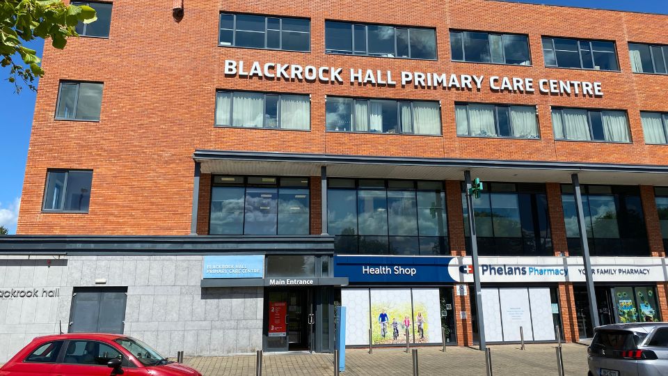 An exterior photograph of the Blackrock Hall Primary Care Centre that has a Hidden Hearing clinic inside above the ground floor pharmacy