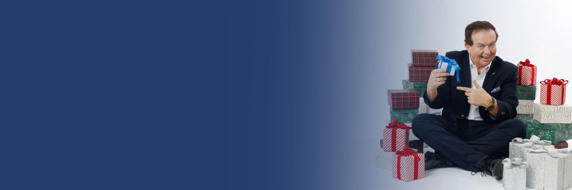 Marty Morrissey pointing at a gift