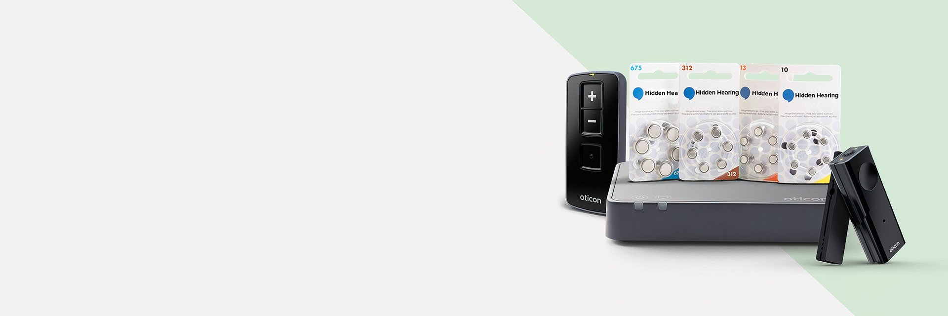 Hearing aid batteries, Oticon remote controls, and hearing aid accessories displayed on a light background.