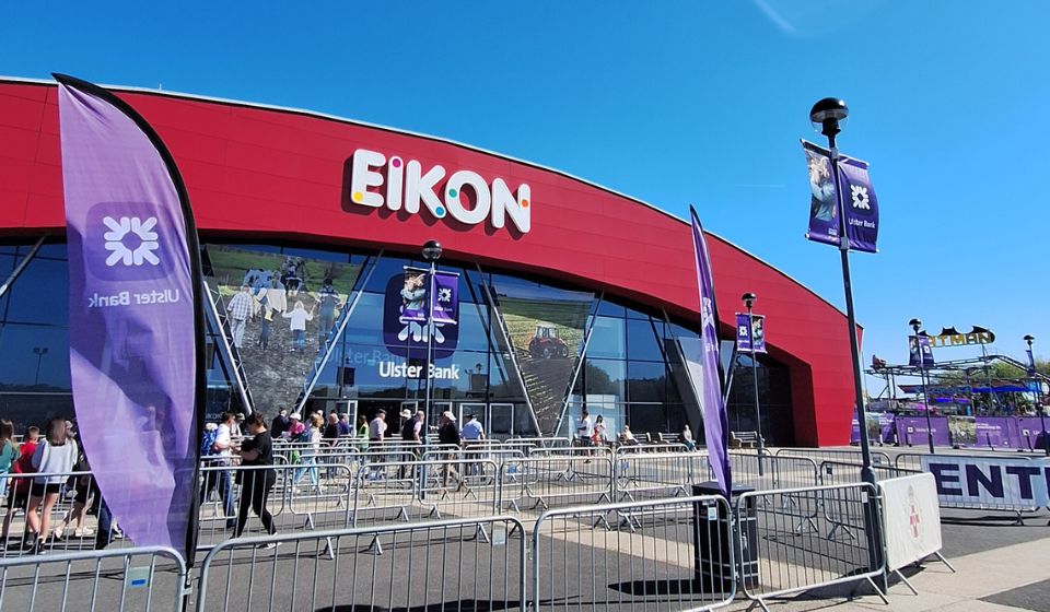 A large building labelled the Eikon Centre on a nice day with a blue sky in the background
