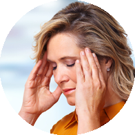 [OPT] A woman experiencing discomfort while holding her temples