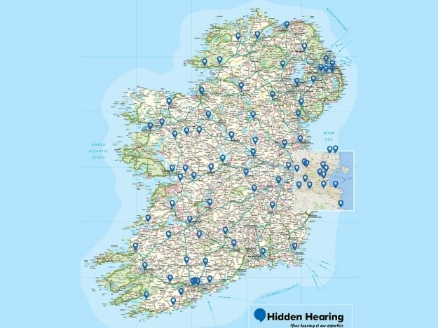 [GEN] A detailed map of Ireland displays multiple blue location markers representing Hidden Hearing clinics spread across the country. The Hidden Hearing logo and tagline, 'Your hearing is our expertise,' appear in the bottom-right corner.