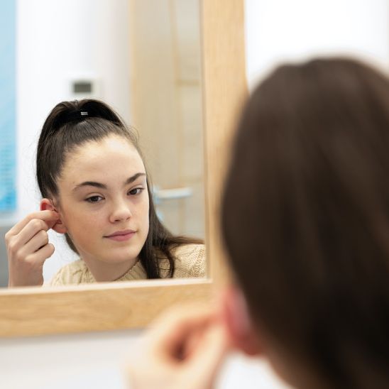 Gift Of Hearing Winner Una Walsh trying her hearing aids