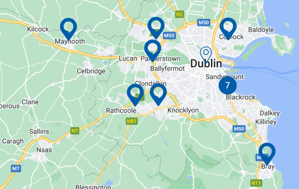 A digital map shows multiple blue location markers highlighting Hidden Hearing clinic locations around Dublin, including Maynooth, Rathcoole, and Bray, with a cluster of 7 markers in south Dublin.