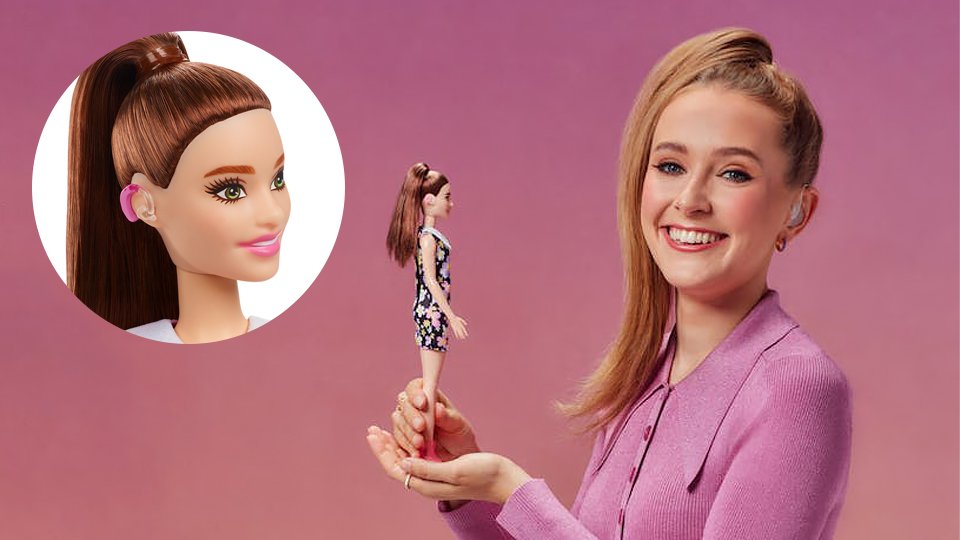 Young woman holding a Barbie doll wearing a hearing aid, showcasing inclusive hearing device designs.
