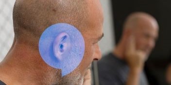 Hearing aid highlighted for discreet hearing support.