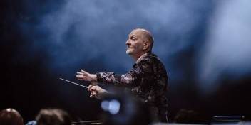 Renowned conductor leads an orchestra after successful hearing restoration