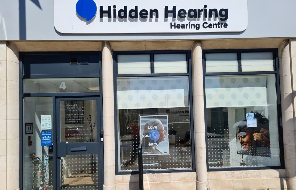 Hidden Hearing Eastbourne clinic exterior showcasing the storefront, signage, and entrance.