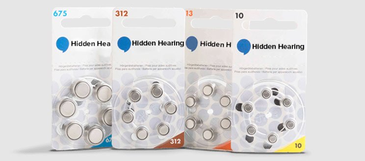 Hearing aid batteries in sizes 675, 312, 13, and 10 with Hidden Hearing branding.
