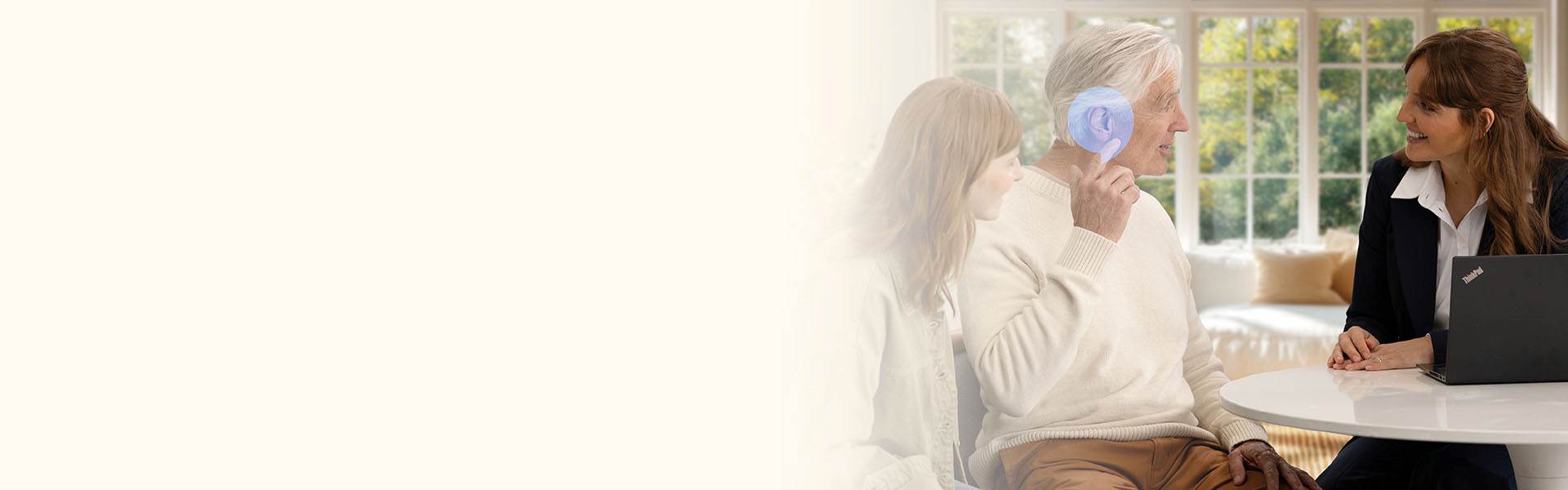 Audika | A man gets a hearing test from an audiologist from Audika. A lady supports the man during the hearing test.