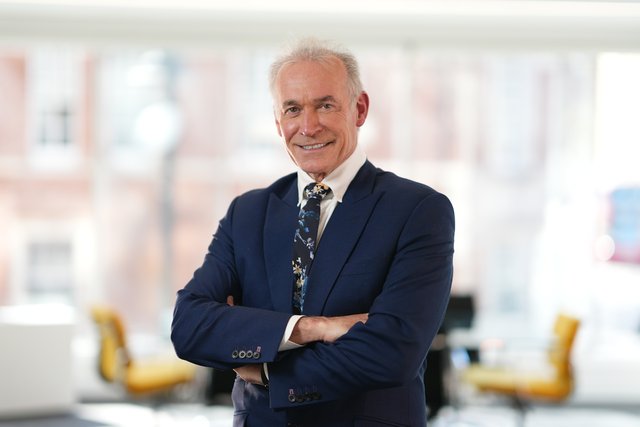 Hearing care professional in a modern office setting