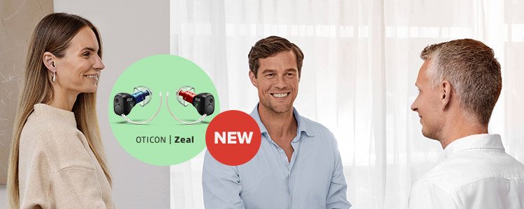 Three individuals in conversation, with the Oticon Zeal hearing aid highlighted alongside a 'New' product label.