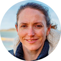 CFBH Ambassador Helen Mol by the seaside wearing a warm coat.