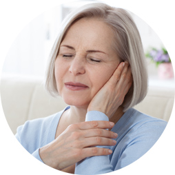 woman experiencing ear pain