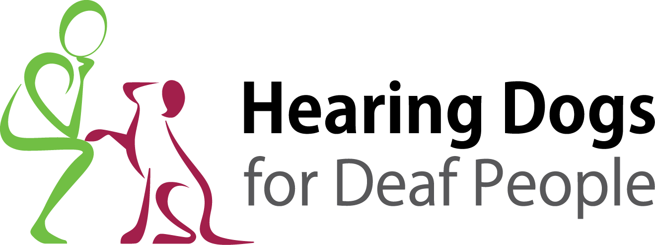 The logo features a green stick figure person kneeling and interacting with a maroon stick figure dog. Text to the right reads: 'Hearing Dogs for Deaf People.'
