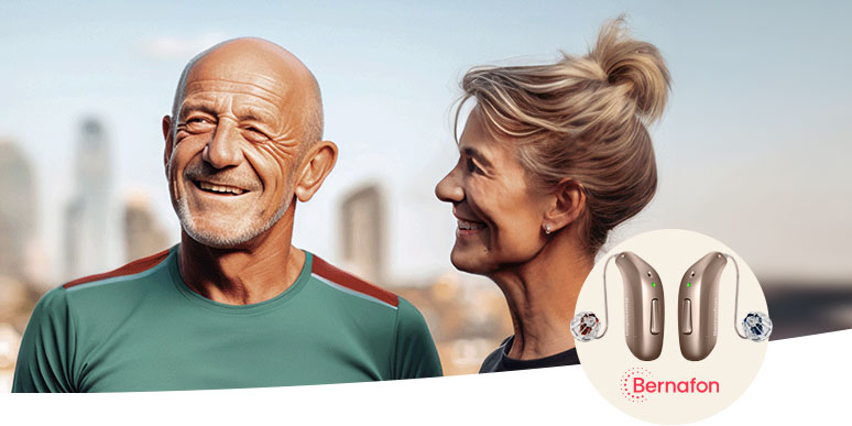 Two adults stand together outdoors with blurred faces, wearing casual athletic attire. The lower-right corner features Bernafon-branded hearing aids, highlighting advanced hearing care solutions against a soft urban skyline backdrop.
