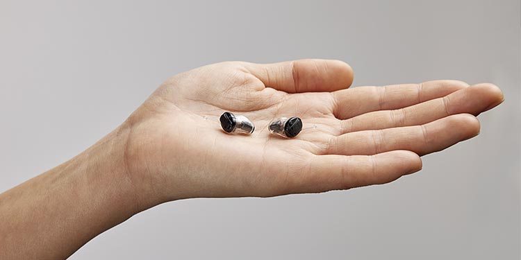 image shows two people and audiologist