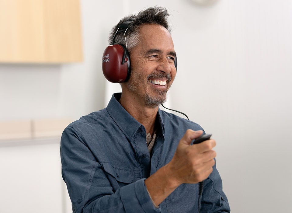 A man taking a hearing test