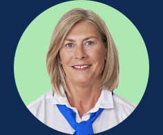 A person with shoulder-length blonde hair wearing a white shirt and blue scarf against a green circular background, bordered by dark blue.