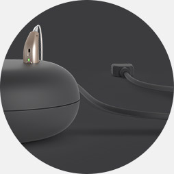 Image shows how to  connect the charger to a power source using the integrated cable.