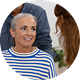 [OPT] elderly person in a striped sweater speaking with a hearing care professional