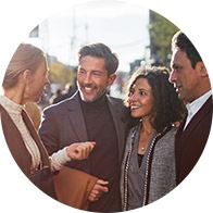 People communicating outdoors in a group setting