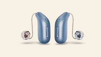 blue behind-the-ear hearing aids with slim tubes and clear earpieces