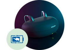 Appareil auditif rechargeable placé dans un boîtier de charge élégant, accompagné d’une icône de batterie.