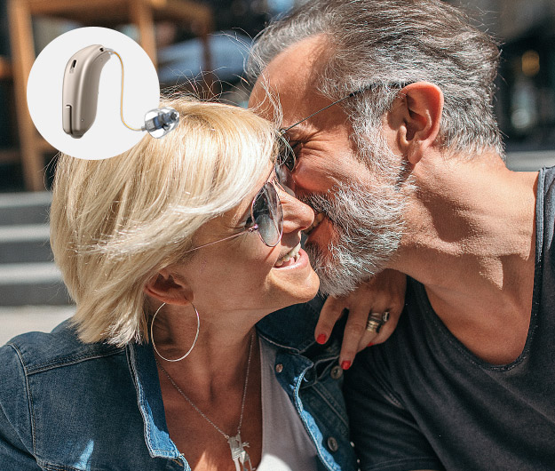 Image shows person wearing Oticon Siya hearing aids