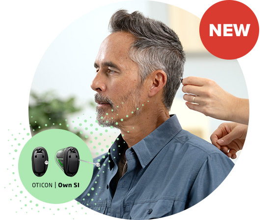 Man getting Oticon Own SI hearing aid fitted